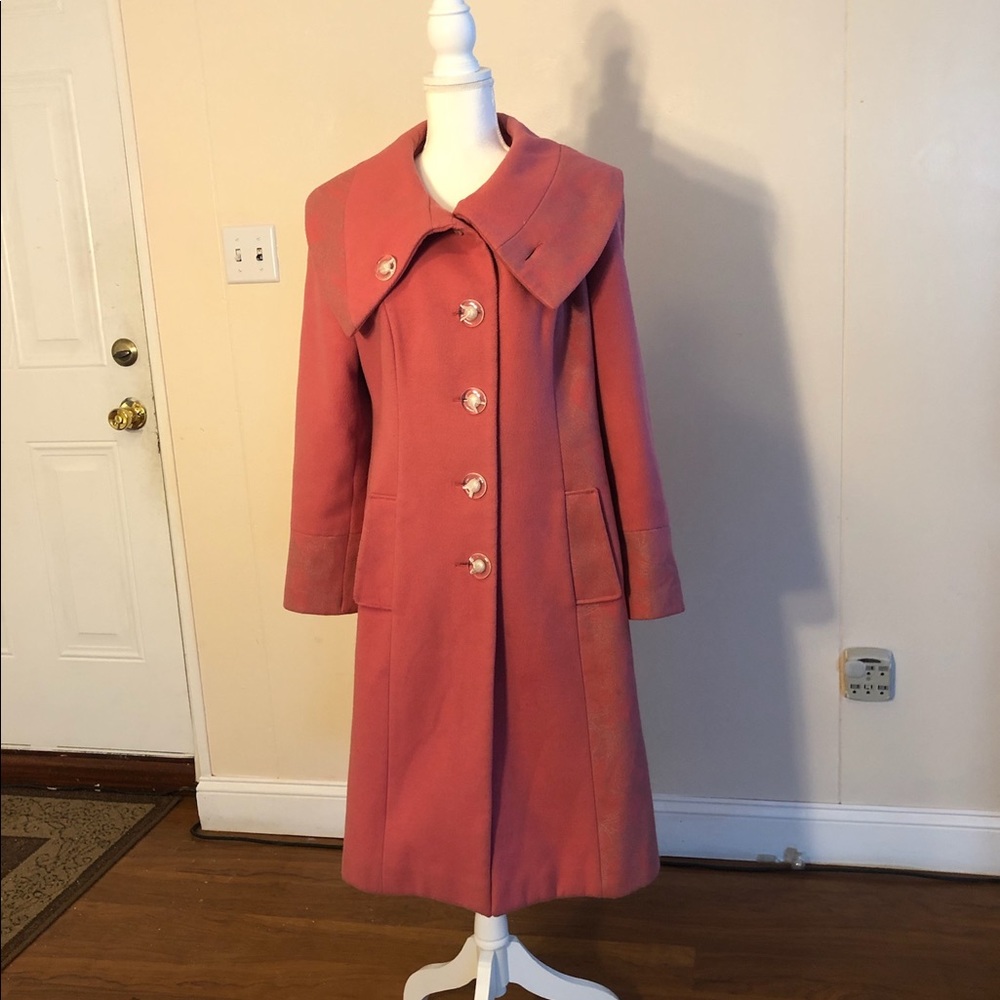 Modern pink Coat I purchased from my travels to Europe.I usually wear size 10-12